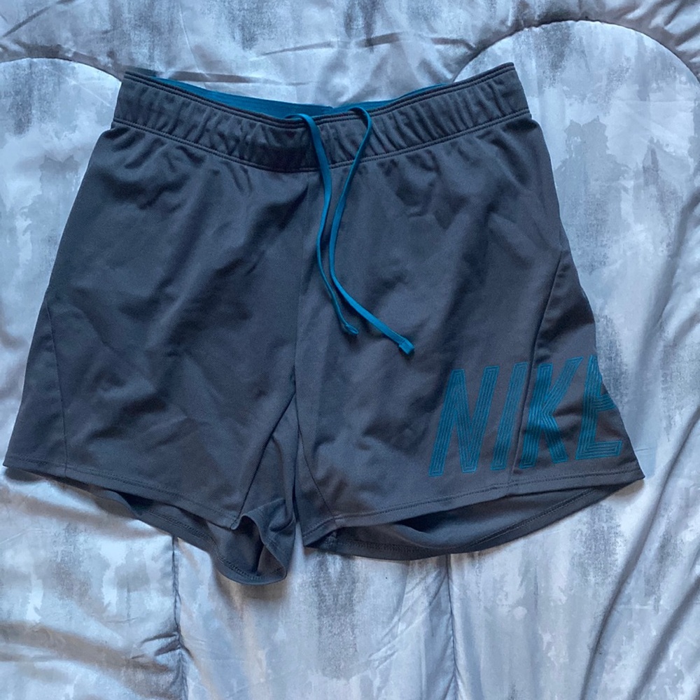 women’s xs grey nike shorts with blue lettering